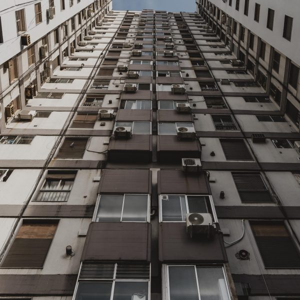 low-angle-massive-concrete-building-city-scaled.jpg